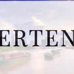Two Cargo Ships Sailing Near City